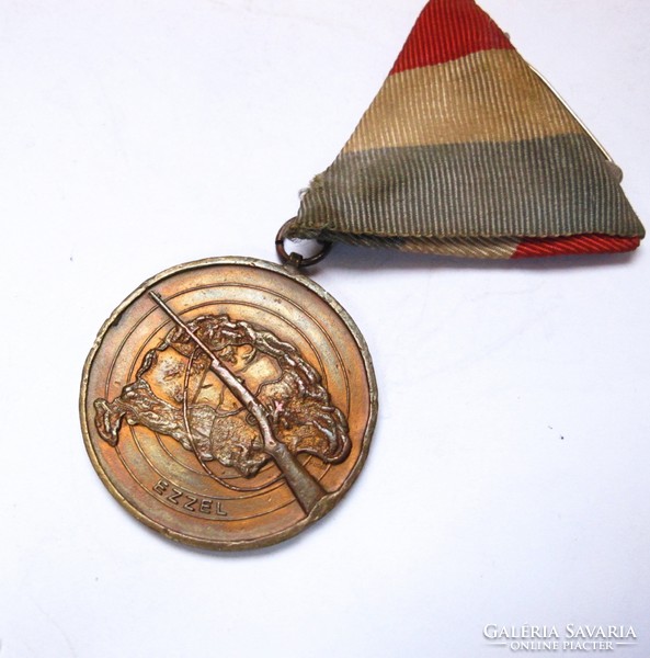 ‘With this’ shooter medal.