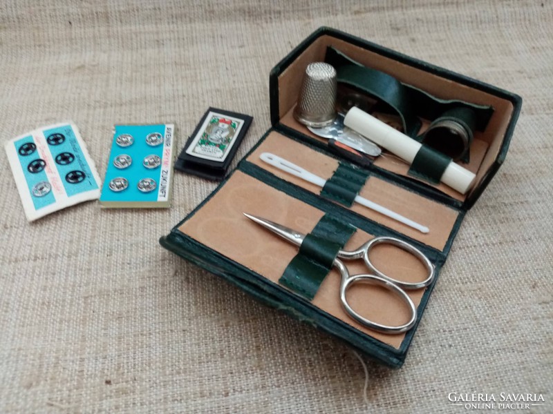 Retro travel sewing kit in leather case