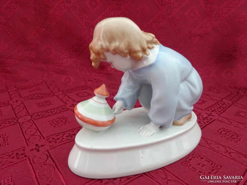 Zsolnay porcelain, figural sculpture. Child playing with a snail. Length: 16 cm. He has!