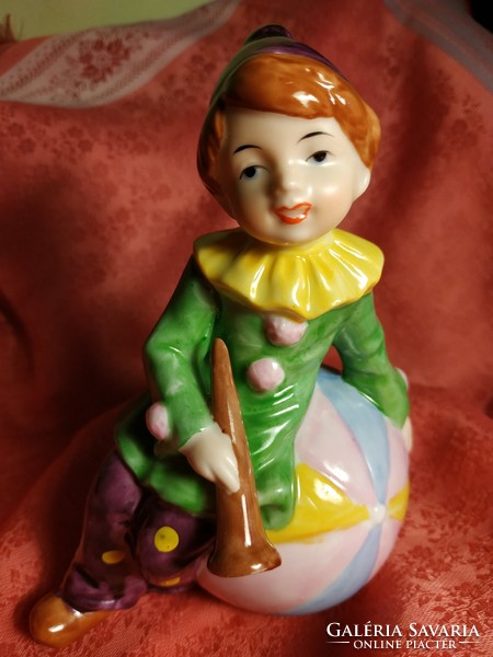 Clown resting on his ball, porcelain nipp