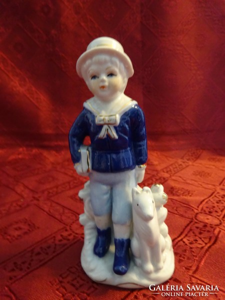 German porcelain figurine, boy with dog, height 13 cm. He has!