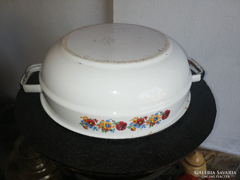 Enamel bowl with beautiful patterned flowers, nostalgic piece of rustic decoration