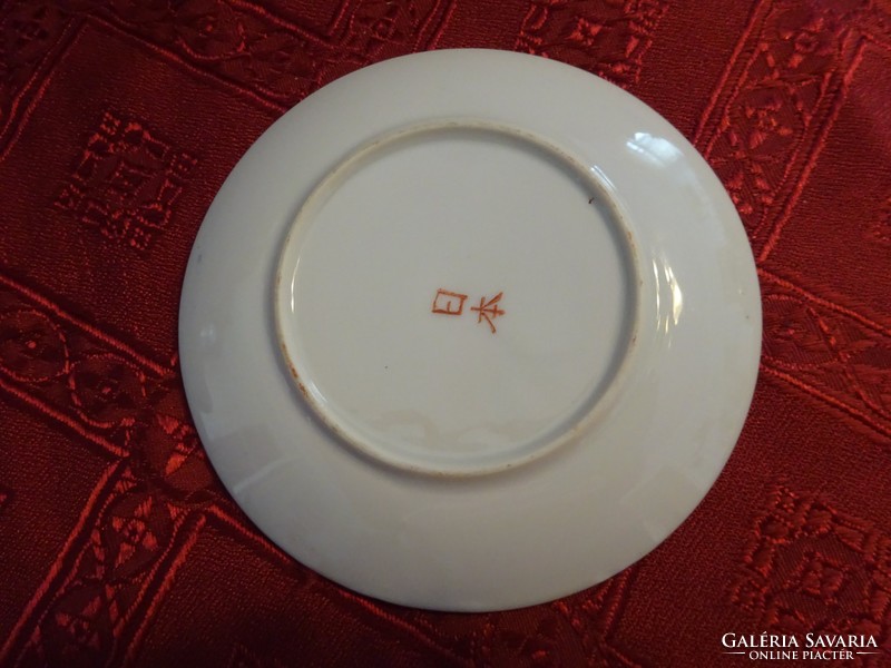 Japanese porcelain coffee cup coaster, diameter 11 cm. He has!