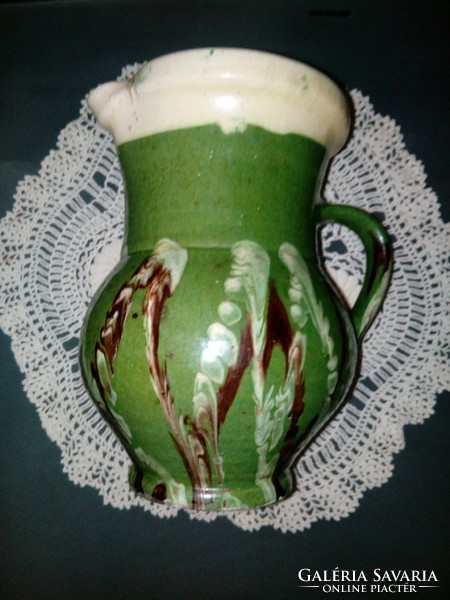 Old ceramic glazed jug