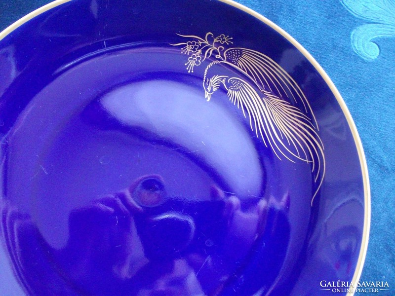 Cobalt decorative plate with hand-painted golden bird of paradise