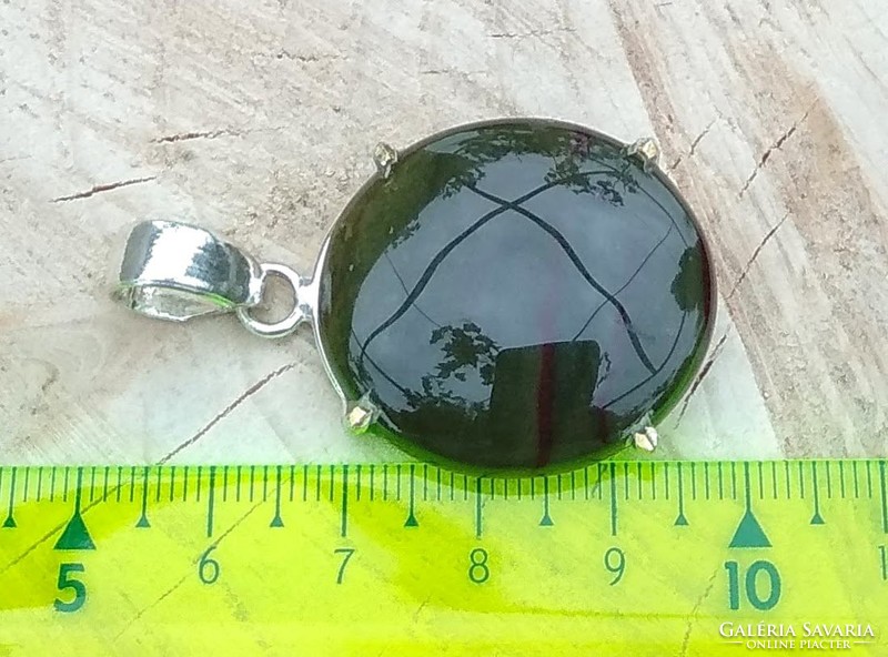 Heliotrope cabochon pendant in a silver-plated socket