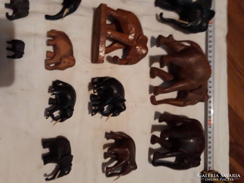 18 wooden carved elephants