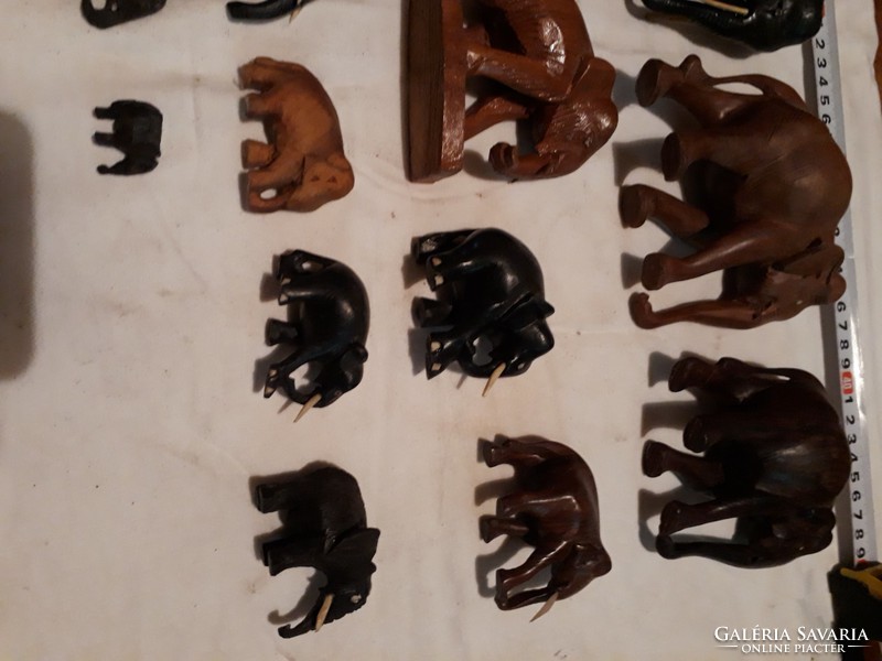 18 wooden carved elephants