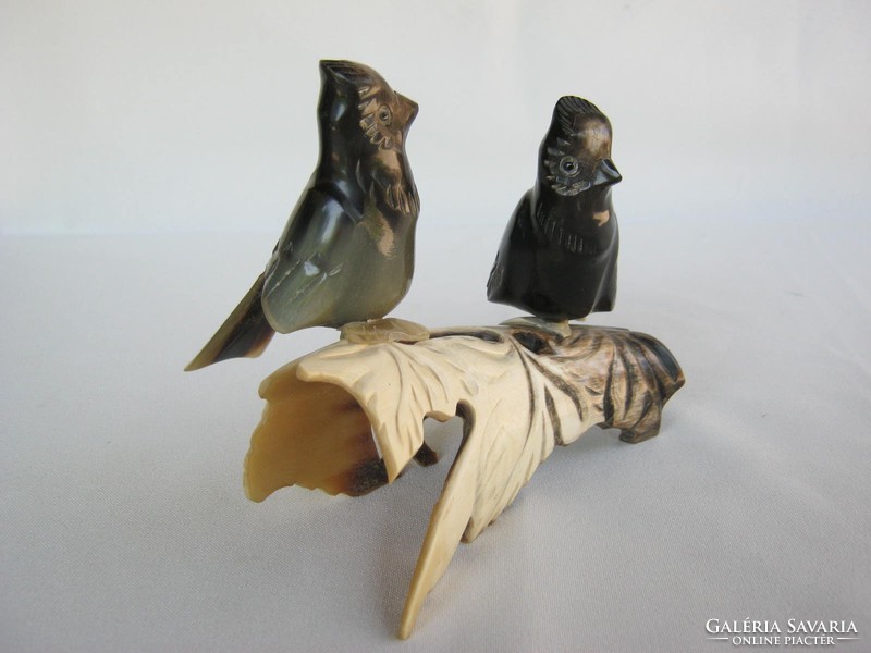 Pair of handmade horned birds