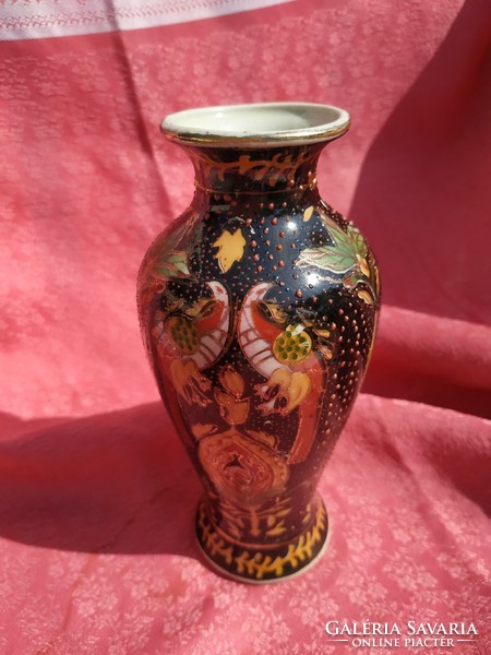 Oriental hand-painted vase with birds of paradise