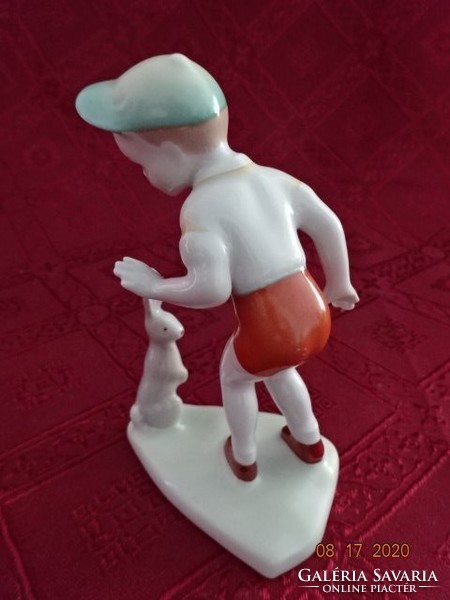 Aqiuncum porcelain, little boy with the bunny, hand painted, height 12 cm. He has!