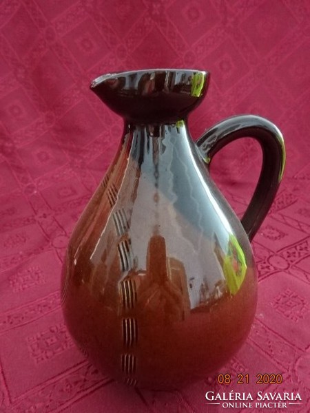 Glazed ceramic jug, height 16 cm. He has!