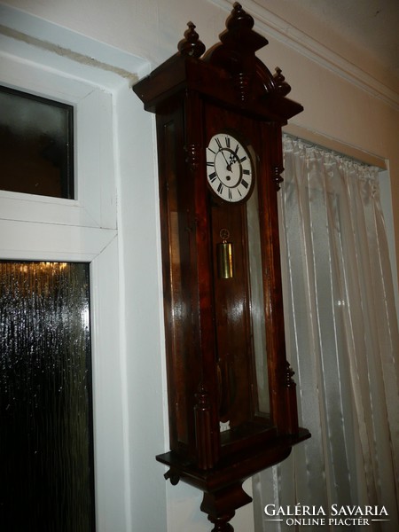 A large, 125 cm, heavy poplar veneer pewter German wall clock from the turn of the century