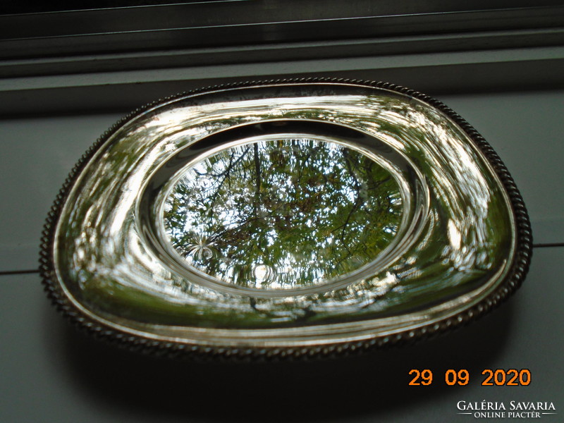 Silver-plated rounded rectangular decorative bowl with appliqué braided rim pattern
