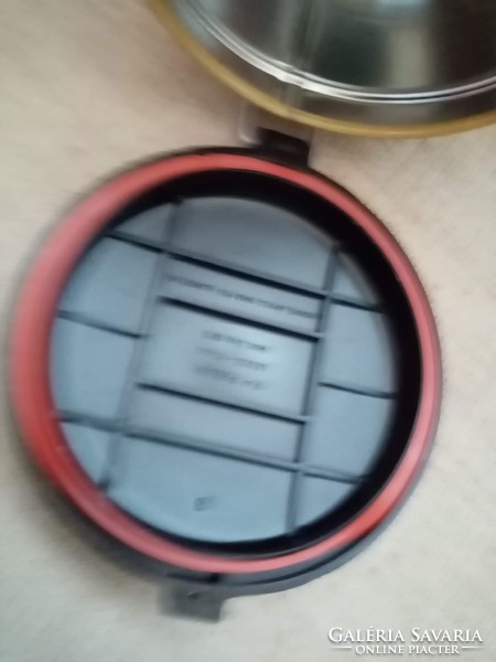 Old marked coffee or tea metal box with a vinyl lid with a snap that can be easily closed