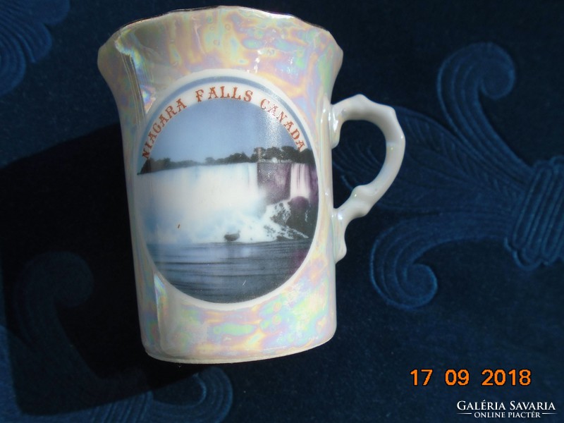 Souvenir cup with the Niagara Falls and the national symbol of Canada, the maple leaf