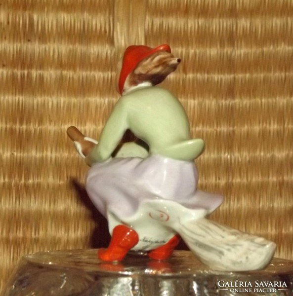 Antique porcelain witch from Kőbánya porcelain factory on her vehicle