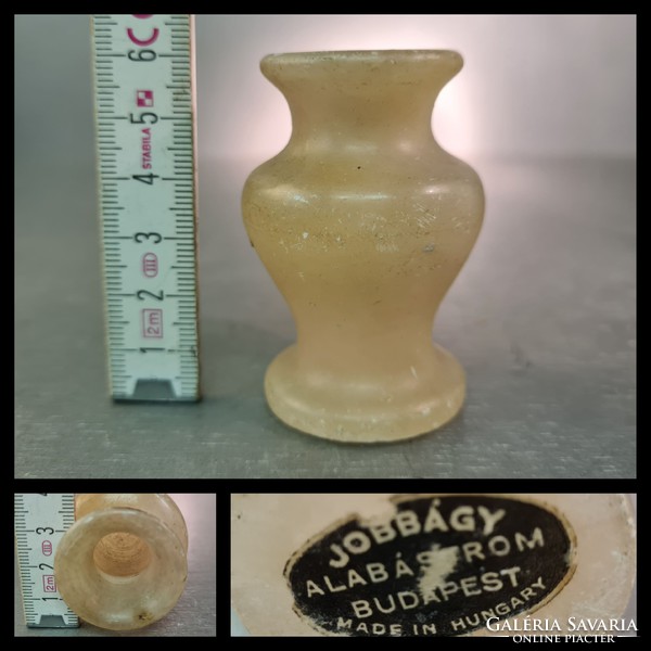 Small alabaster vase labeled 