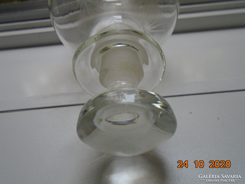 Older drink bottle with polished solid glass stopper, polished patterns.