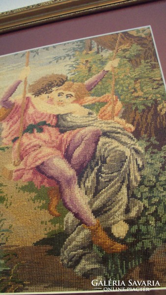 Antique, romantic needle tapestry --- love couple --- in a gold-glossed, carved-edged frame.