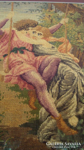 Antique, romantic needle tapestry --- love couple --- in a gold-glossed, carved-edged frame.