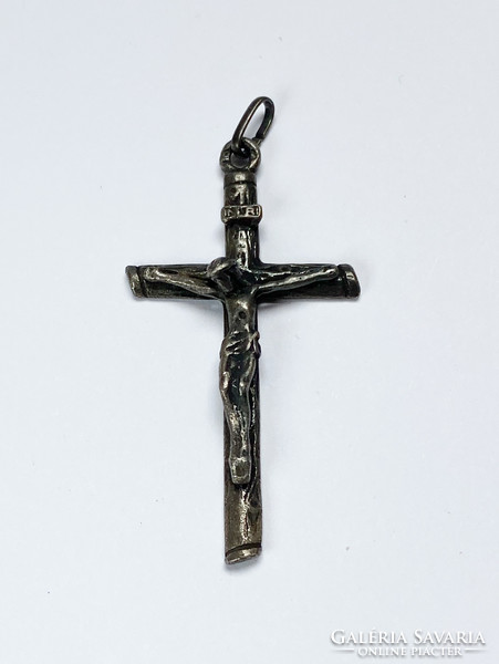 Silver crucifix pendant.