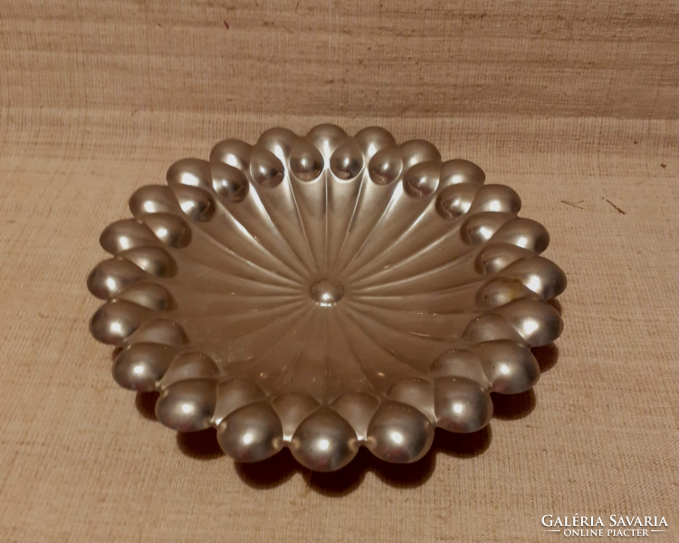 Old blister rim pattern serving tray in good condition on three small legs.