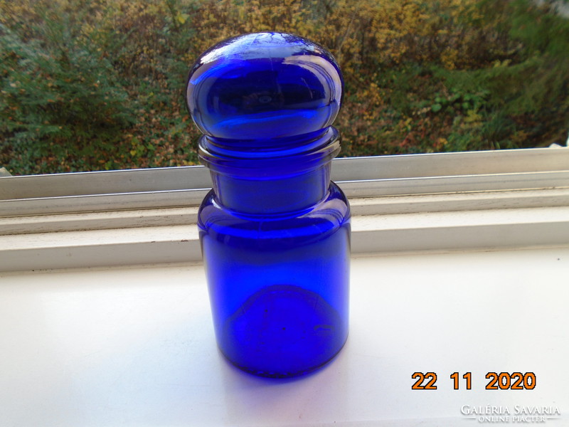 Marked cobalt blue pharmacy glass with a spectacular airtight stopper for liquids as well