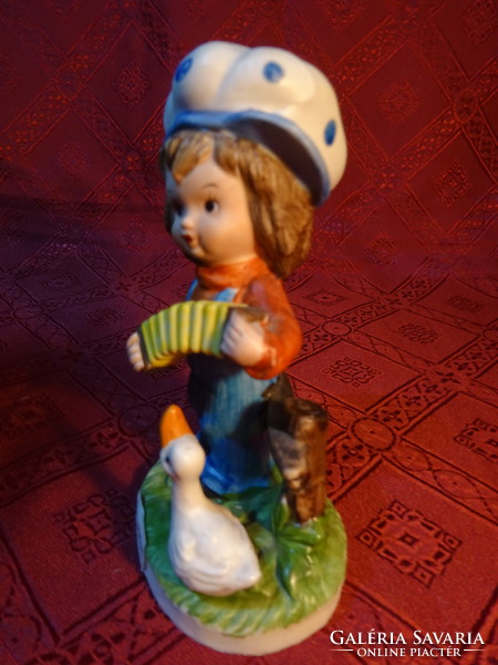 Porcelain figurine, accordion boy with goose, height 14.5 cm. He has!