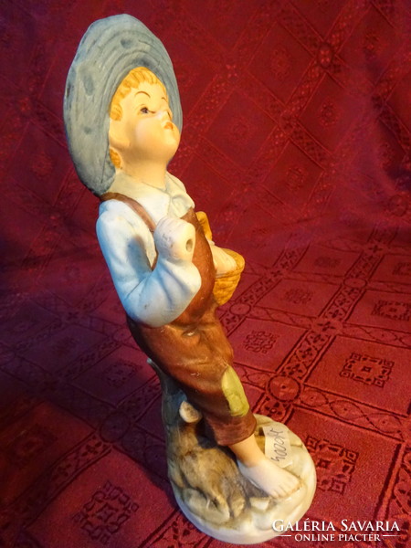 Porcelain figurine, fisher boy is going home, height 19 cm. He has!
