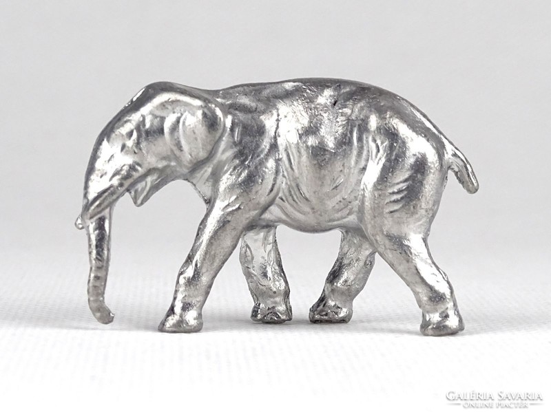 1C848 Kisméretű fém elefánt szobor 5 cm