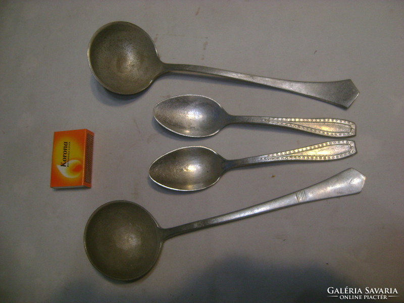 Two retro aluminum ladles and two children's spoons