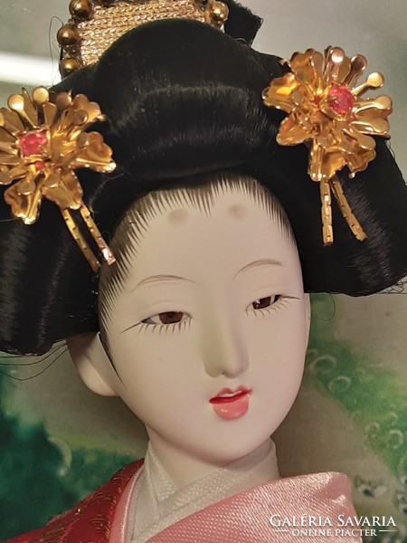 Japanese geisha porcelain doll - sophisticated, delicate workmanship