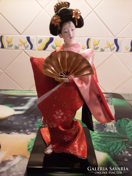 Japanese geisha porcelain doll - sophisticated, delicate workmanship