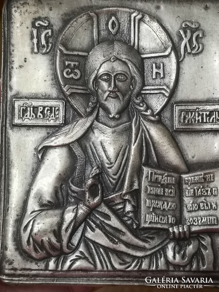Old metal embossed Russian icon of Jesus