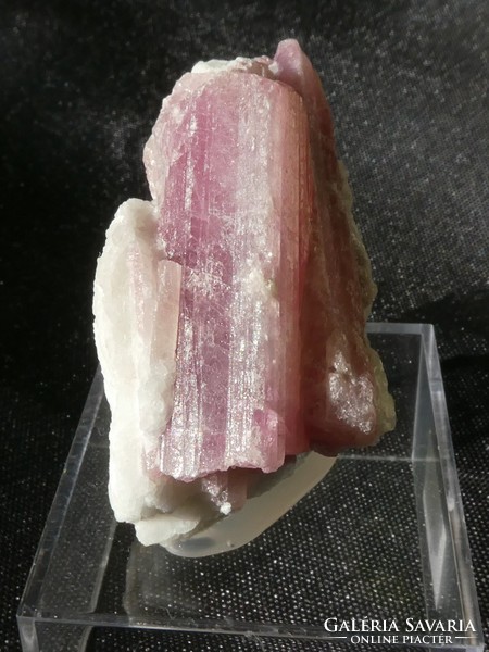 Natural rubellite (tourmaline version) crystals in the bedrock. Collector piece attached to a holder