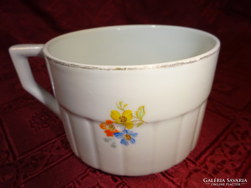Zsolnay porcelain teacup, antique, shield stamped, yellow / blue floral. He has!