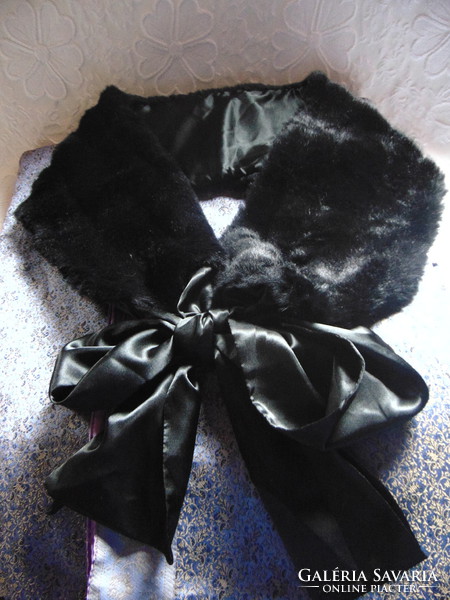 Black faux fur scarf with silk tie and cream knitted hat