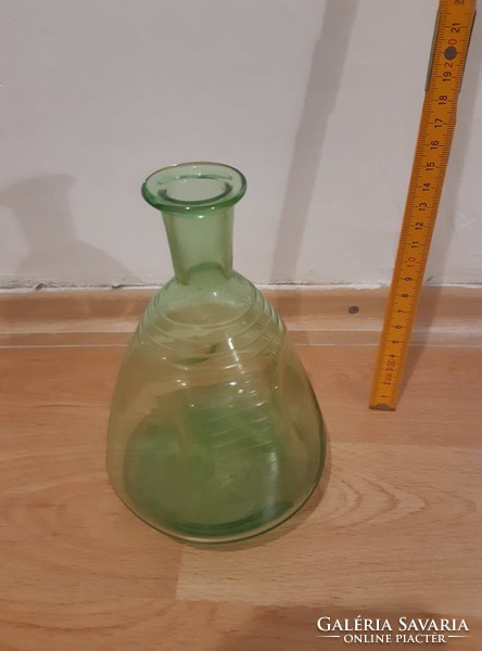 Glass bottle of liqueur blown into a mold