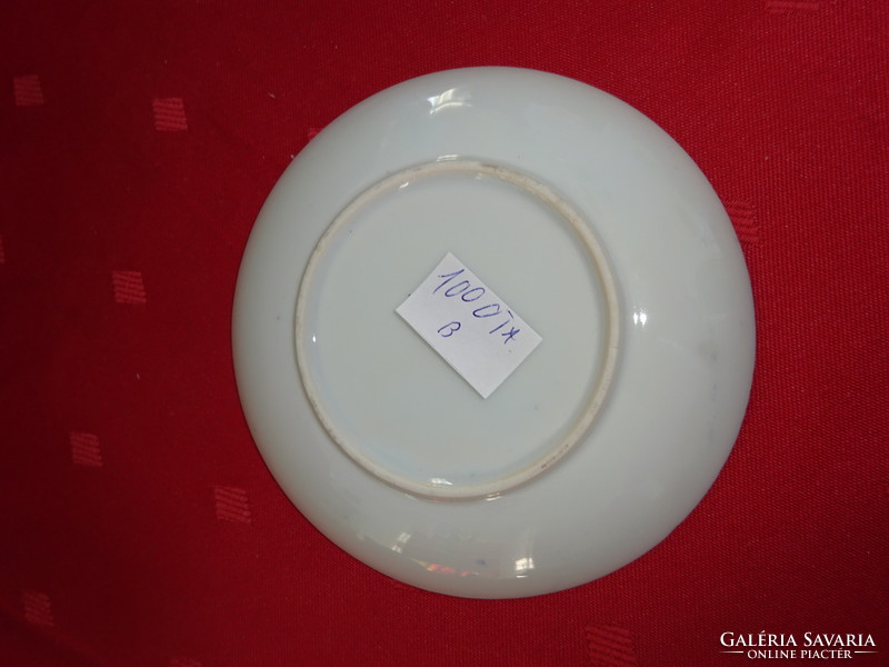 Japanese porcelain coffee cup coaster, diameter 11.3 cm. He has!