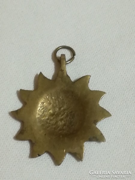 Copper pendant.