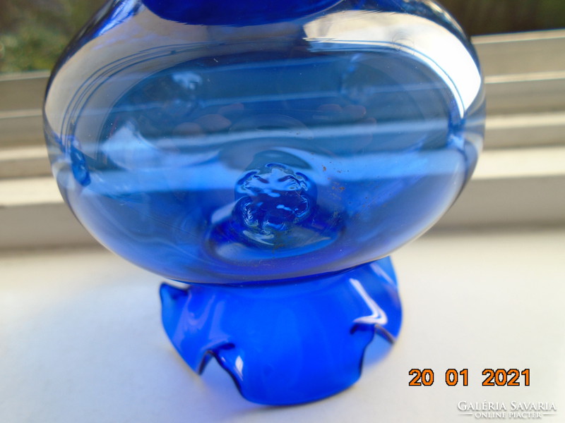 Artist marked glass cobalt blue vase with a ruffled rim with an embossed flower pattern