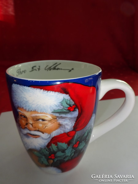 German porcelain Christmas mug with Santa Claus and Santa Claus flowers. He has!