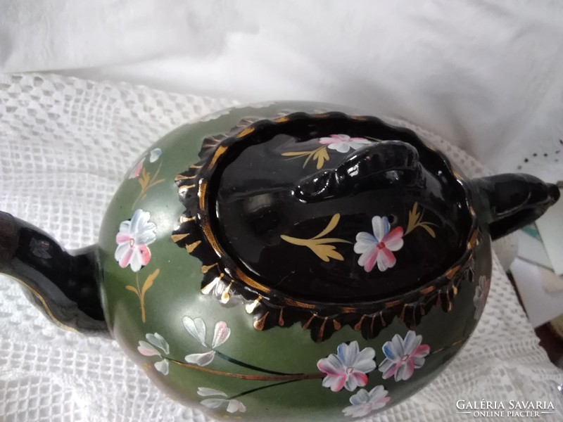 Antique thick-walled, floral porcelain jug in a rarer black-green color