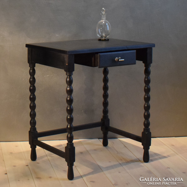 Black antique women's desk, specially renovated, polished to a silky sheen
