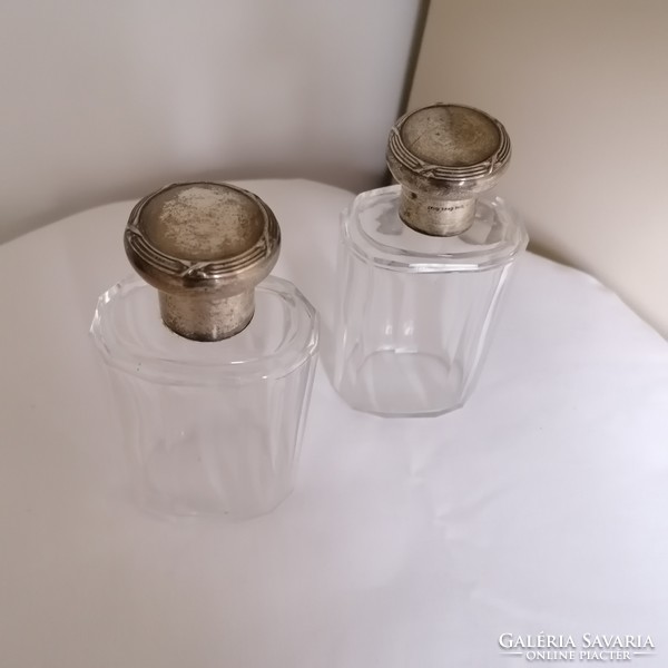 Old bottles with silver tops individually