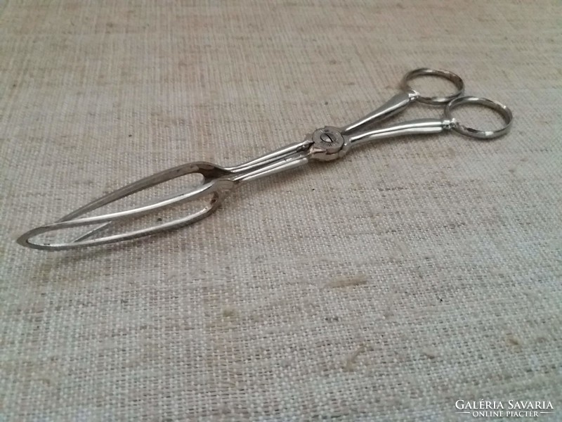 Old, marked meat turning tongs meat needle in good condition