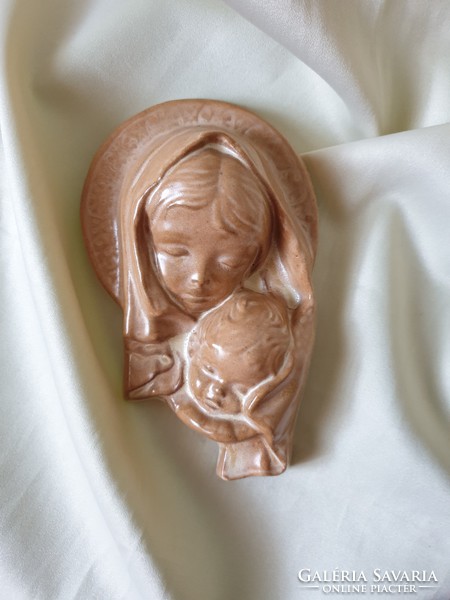 Antique wall ceramic mother with child
