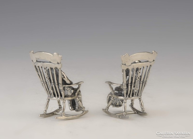 Pair of silver miniature rocking chairs