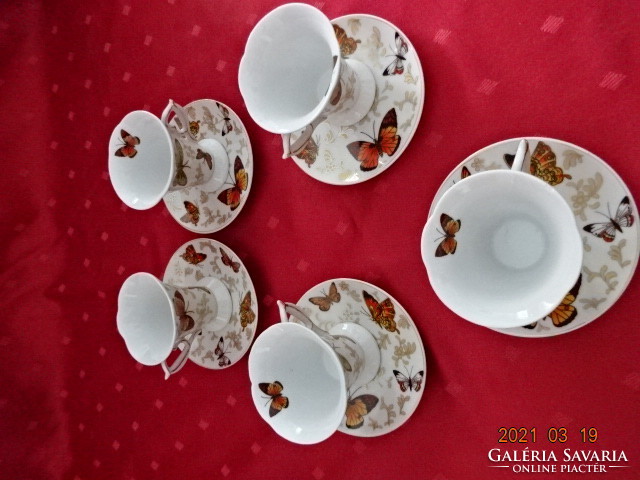 German porcelain, butterfly pattern coffee cup + placemat. He has!